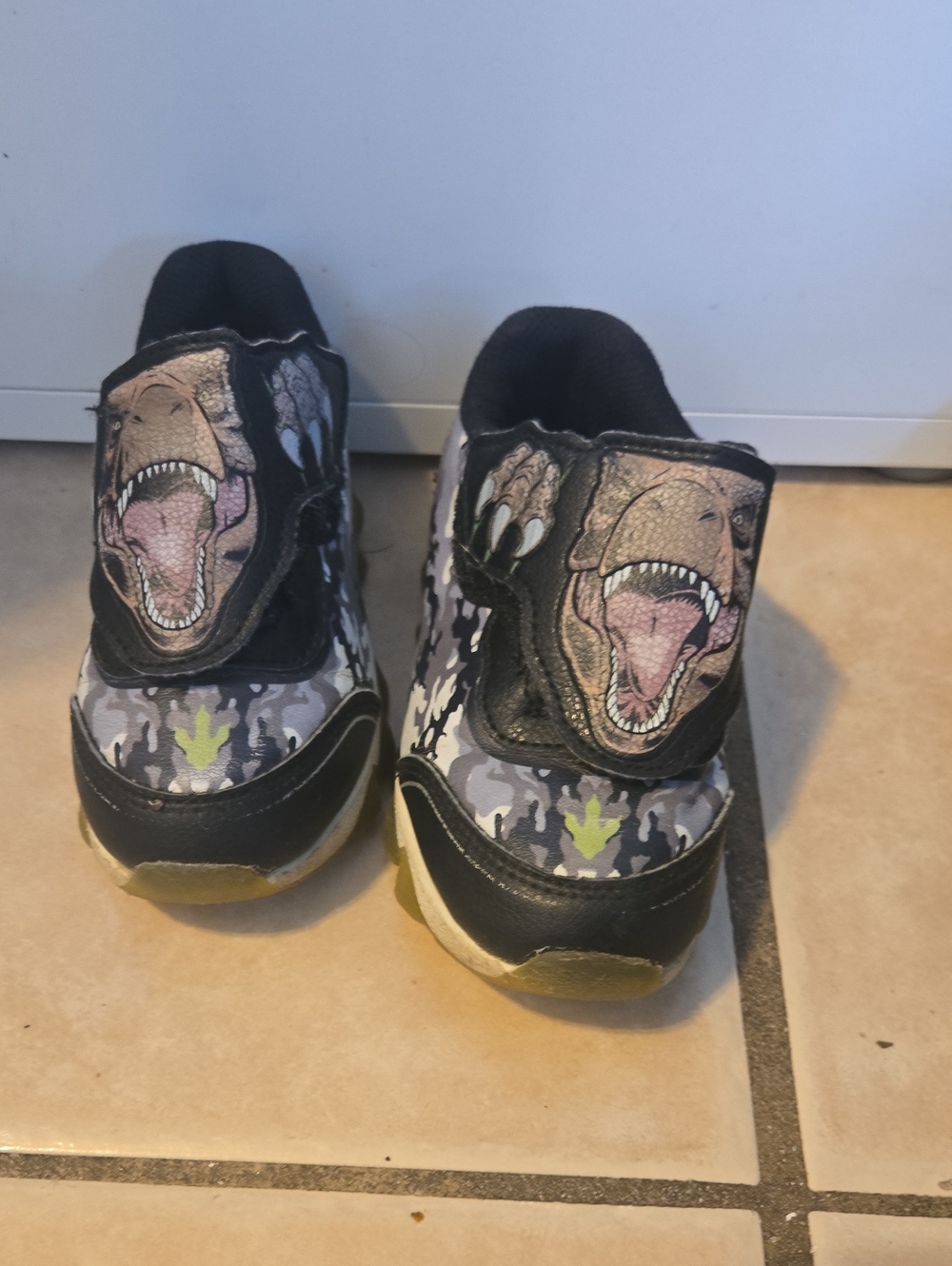 Kids Dinosaur Camo Slip-On Shoes in Black and Gray